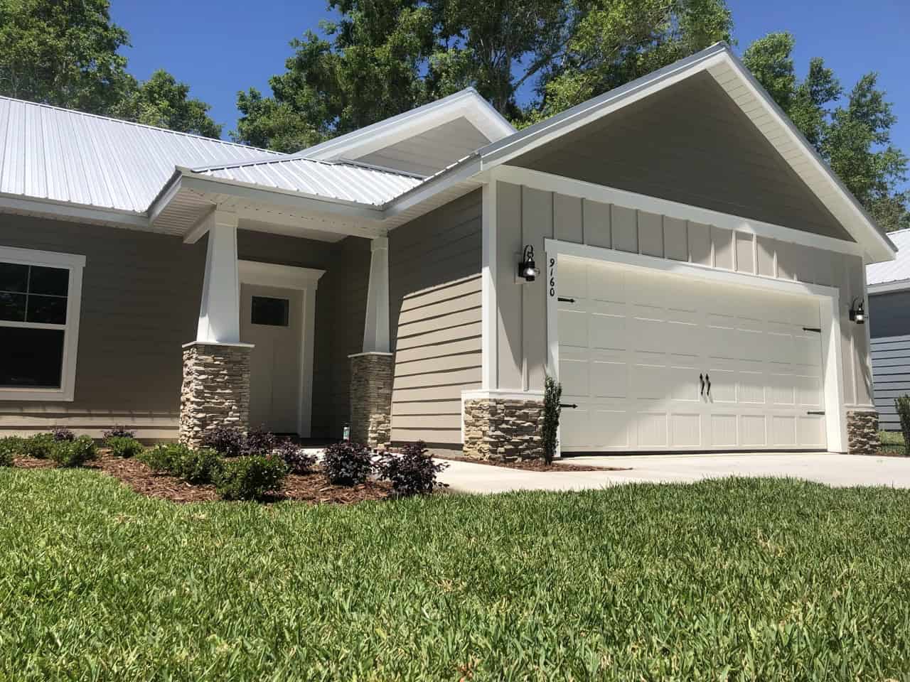 Home exterior with repaired and repainted siding