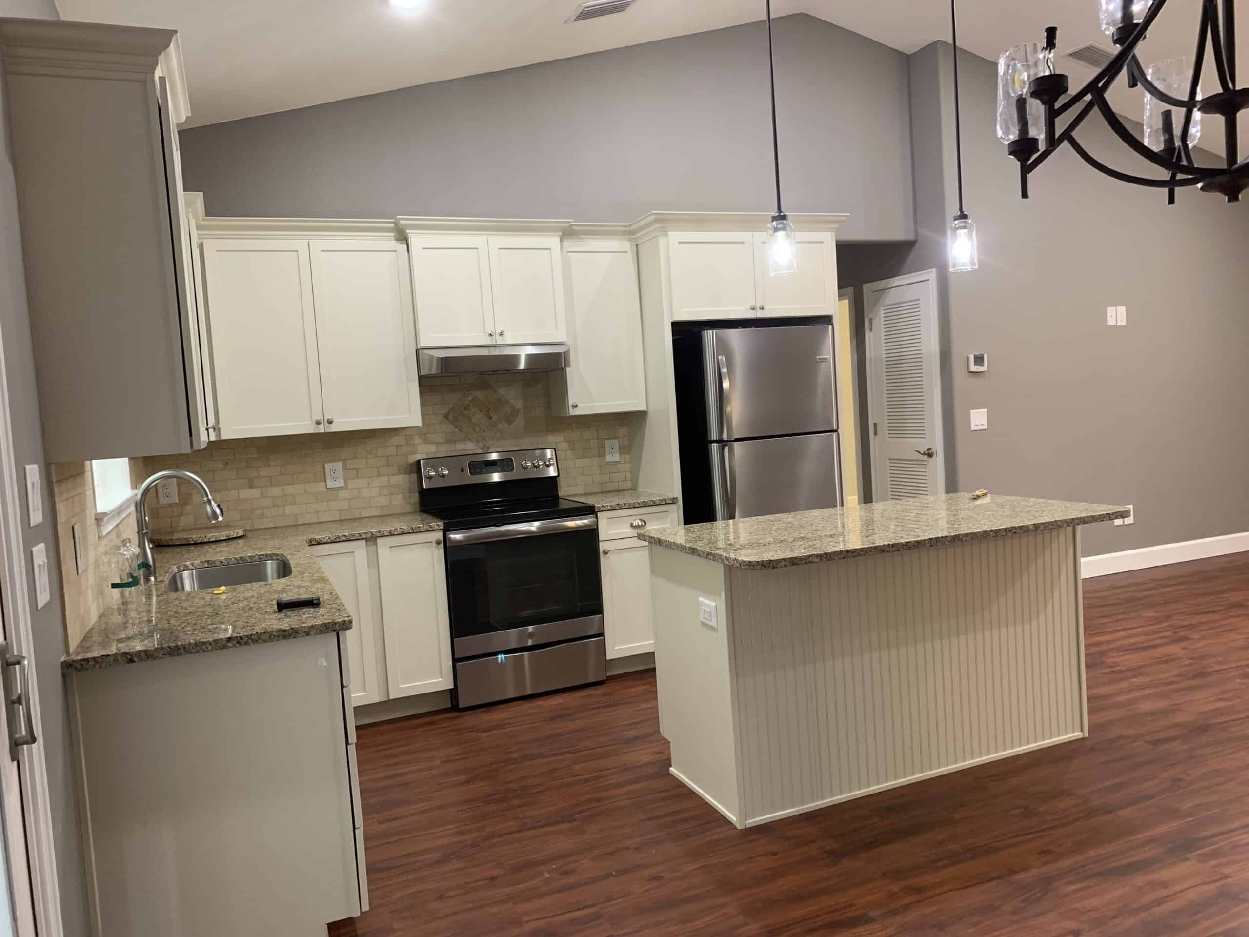 Bright kitchen with granite countertops